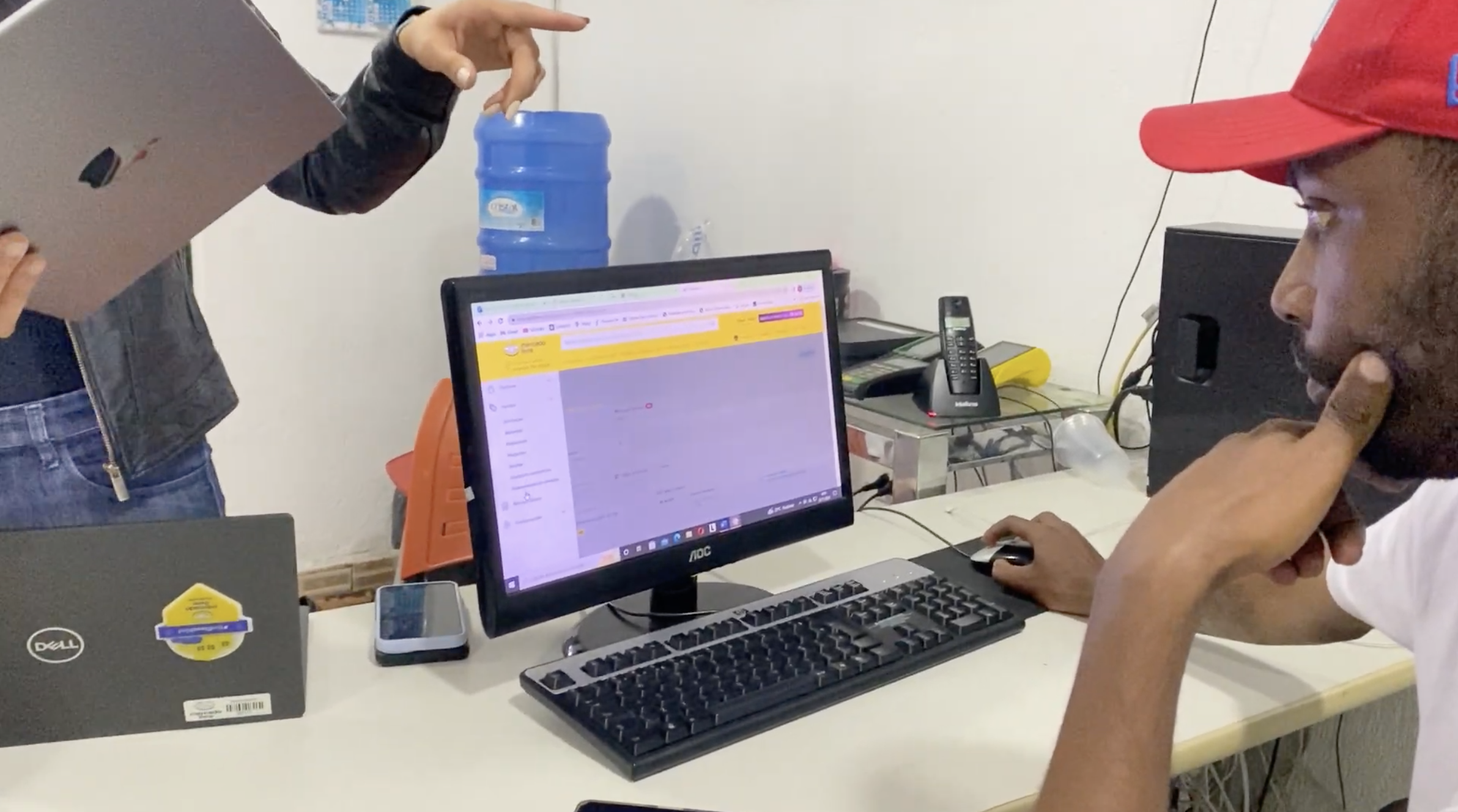 A participant using the platform on a desktop computer at a dealership workstation.